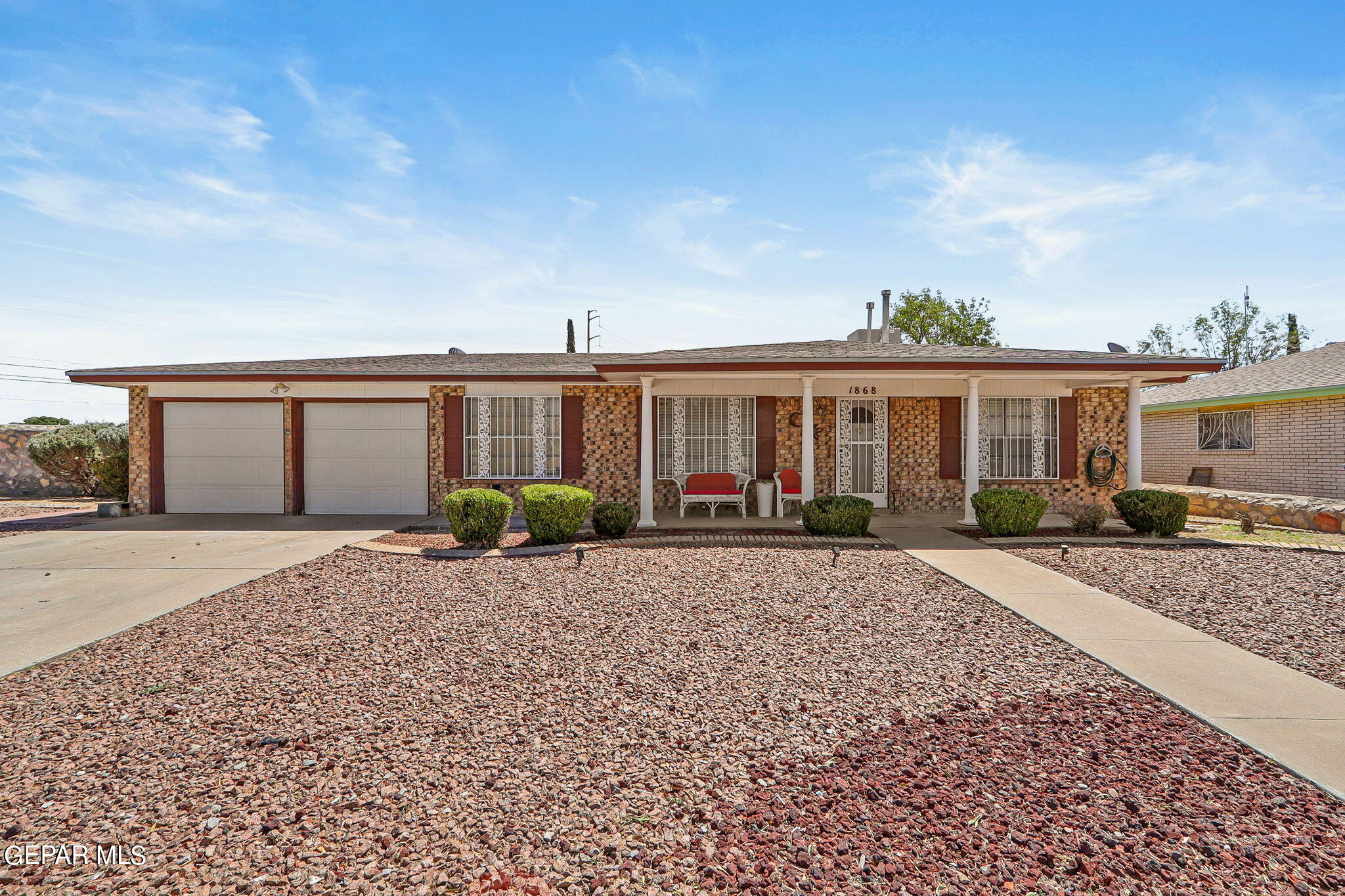 front view of a house with a patio