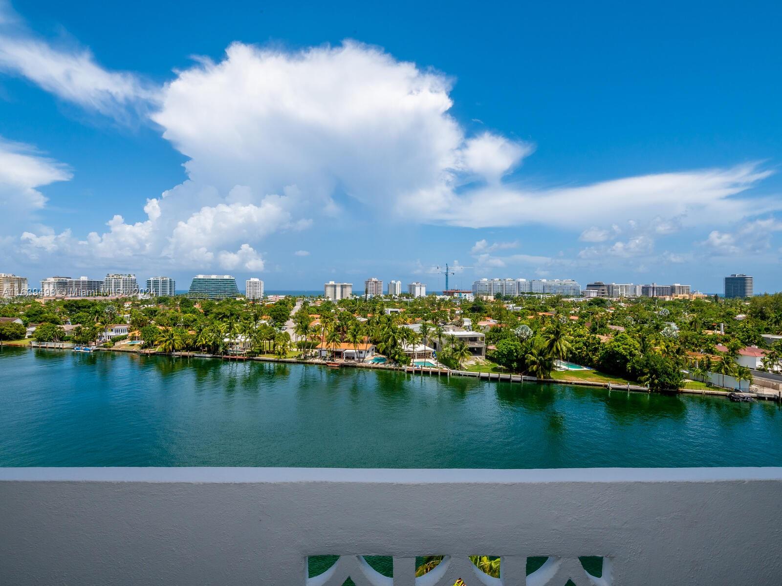 an aerial view of residential building lake and residential houses with outdoor space and lake view