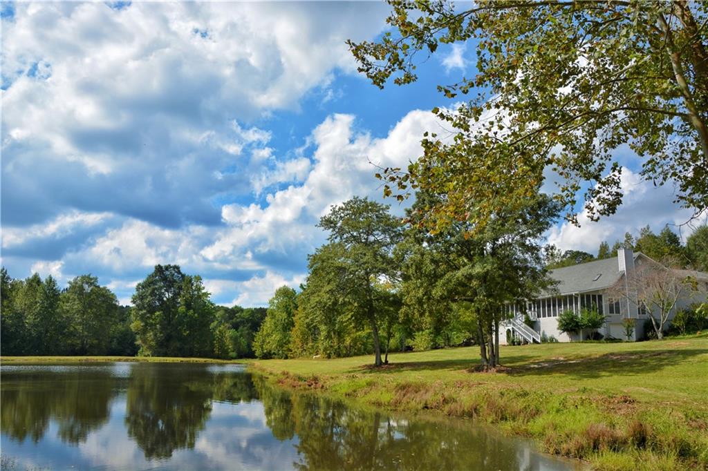 a view of a golf course with a lake