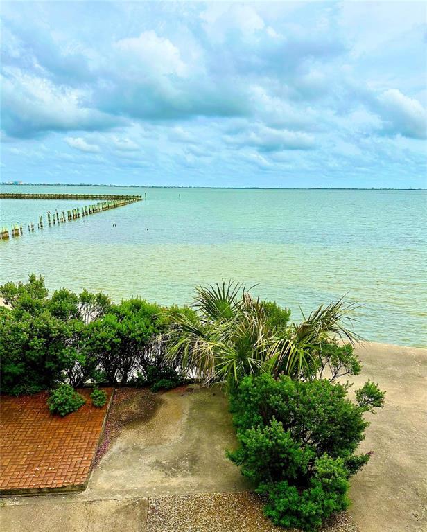 a view of a lake with a big yard