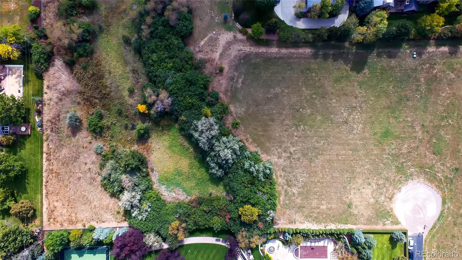 a view of a lake with a yard