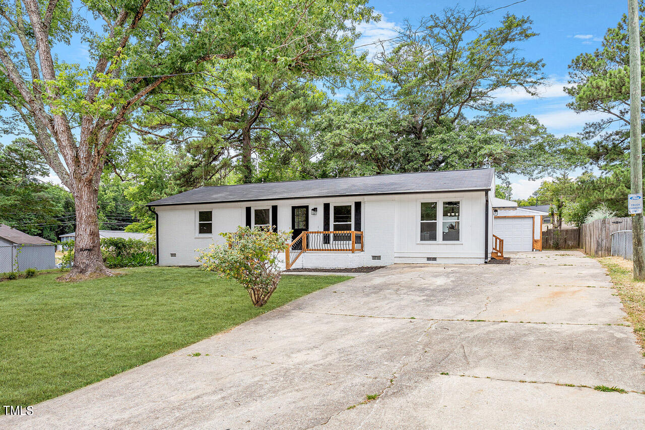 front view of a house with a patio