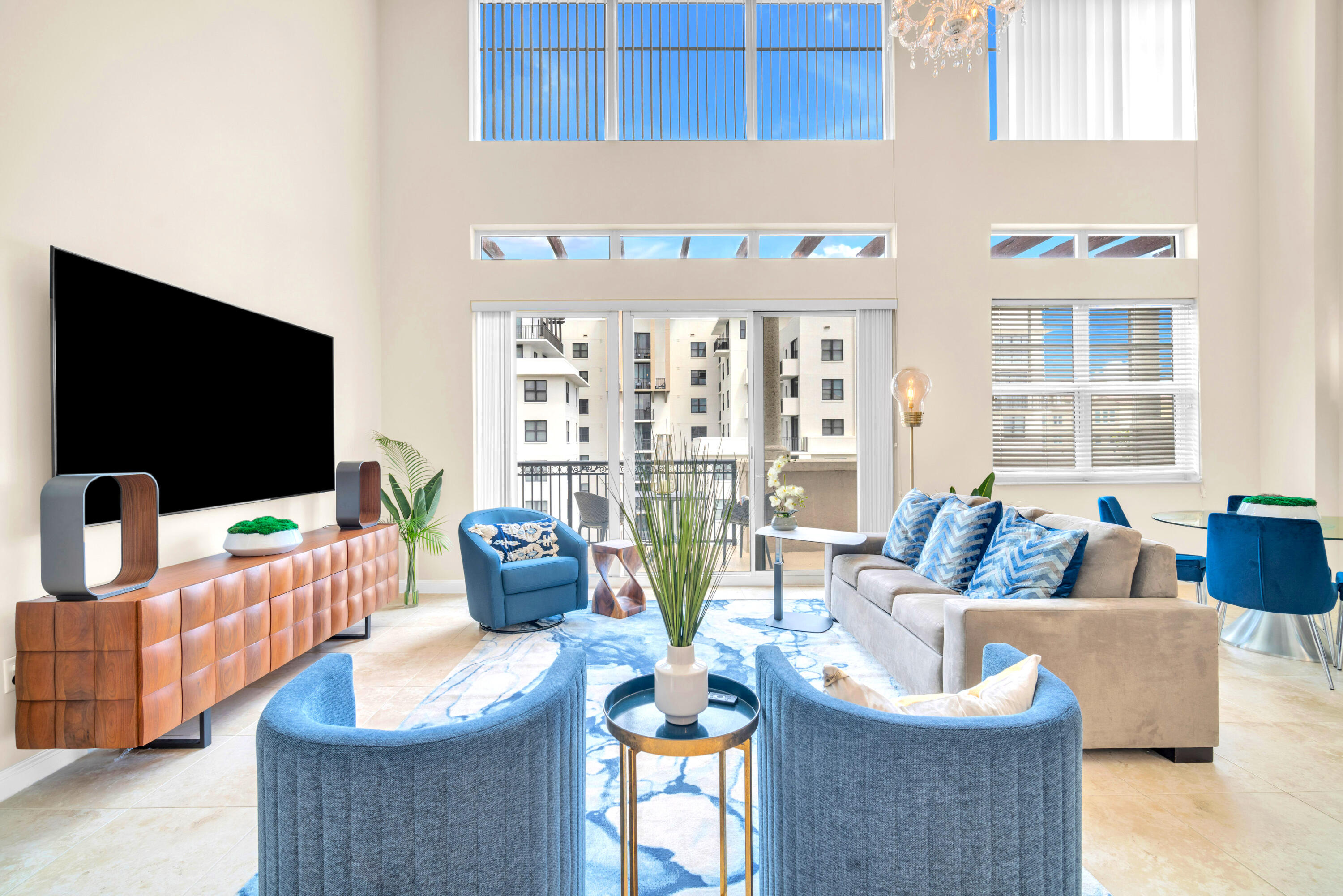 a living room with fireplace furniture and a flat screen tv