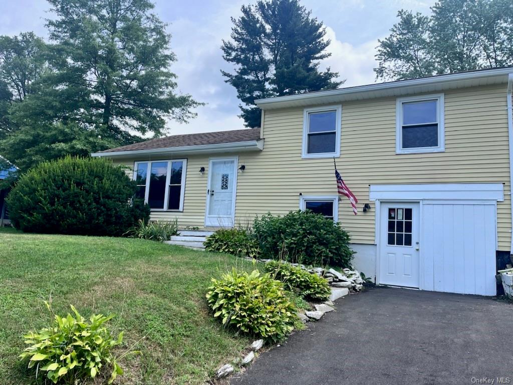 View of front of home with a front yard