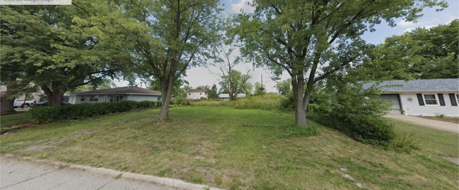 a view of outdoor space and yard