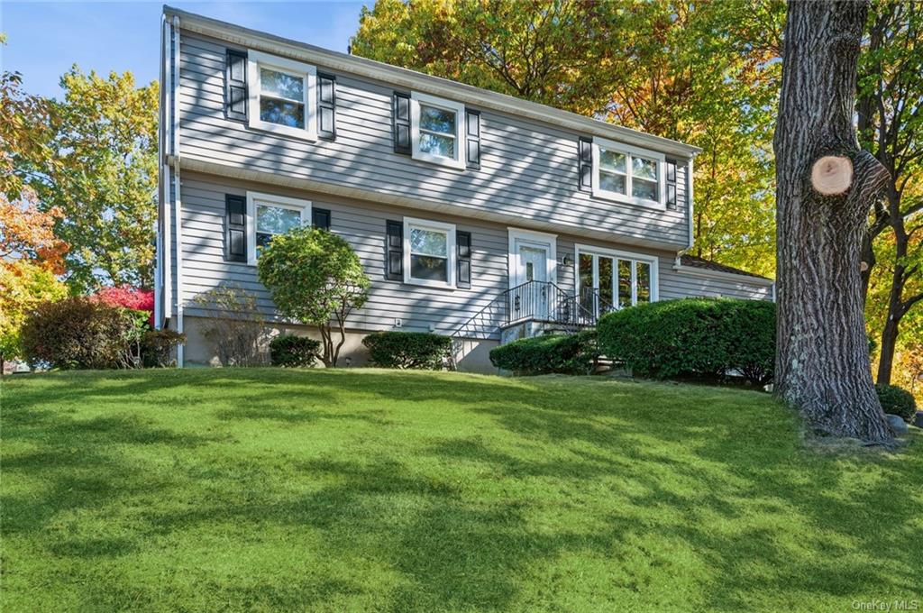 View of front of home with a front yard