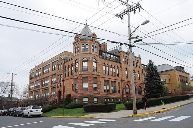 a large building with a sign on it