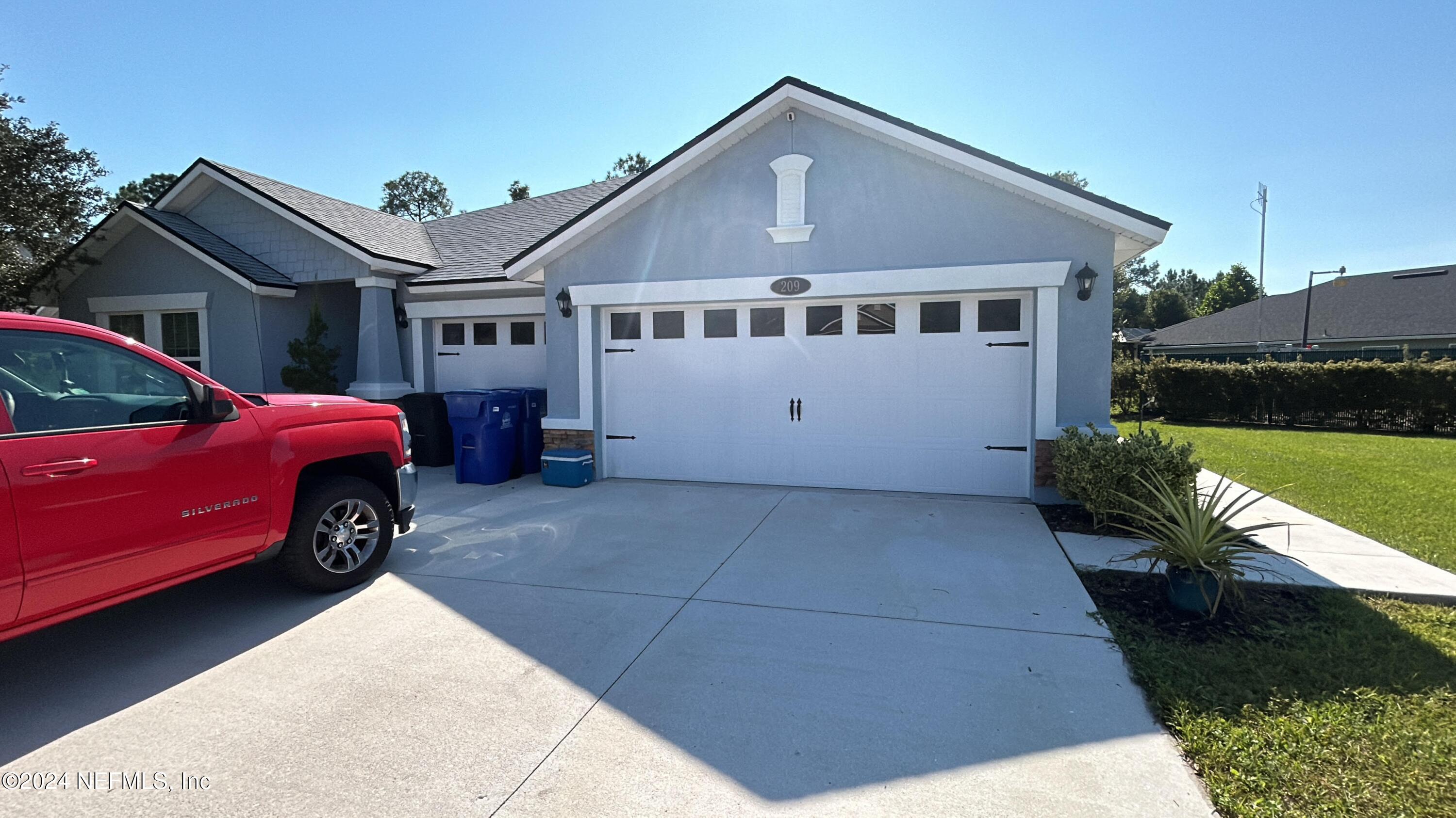 a car parked in front of house