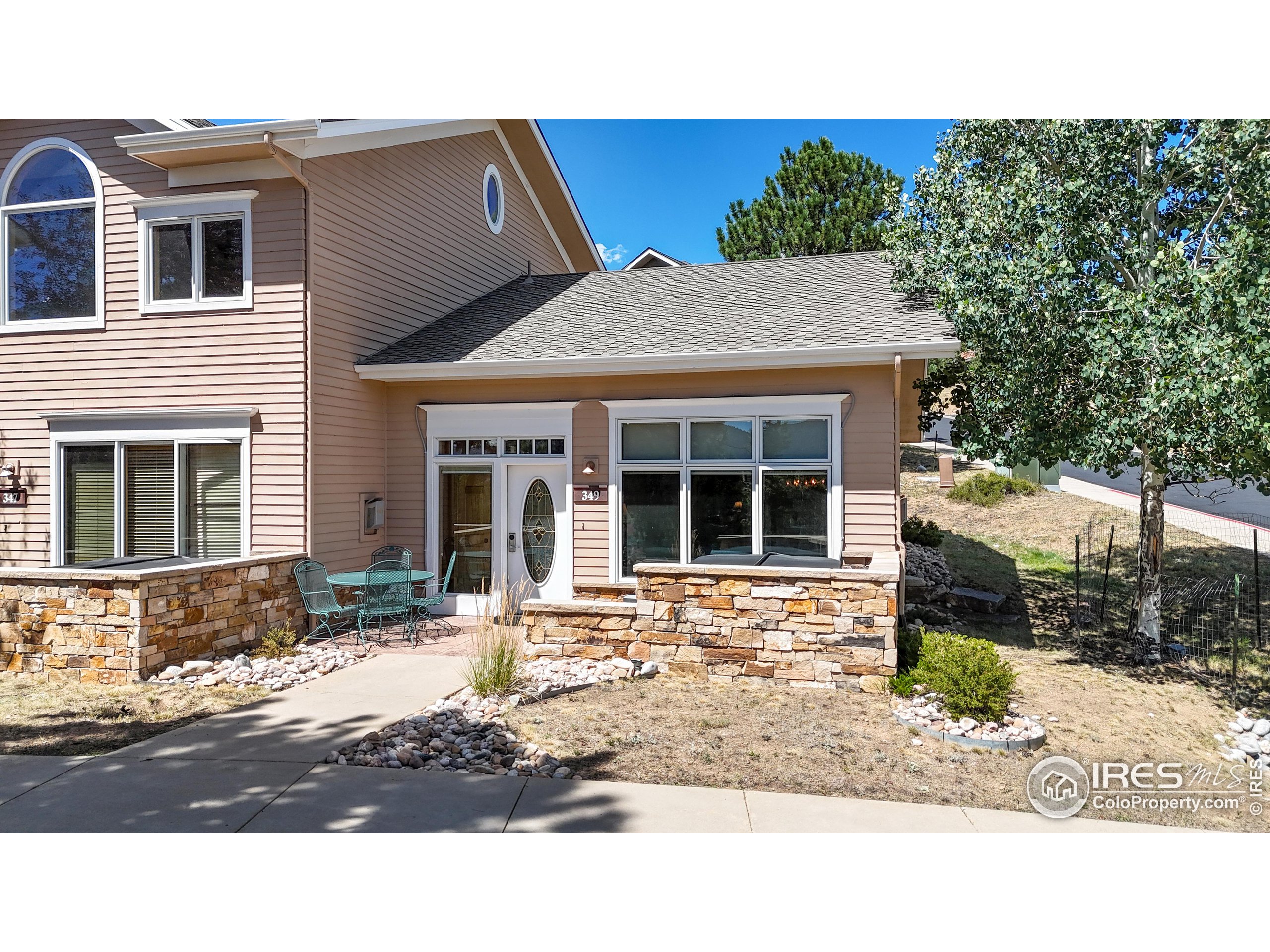 a front view of a house with a patio