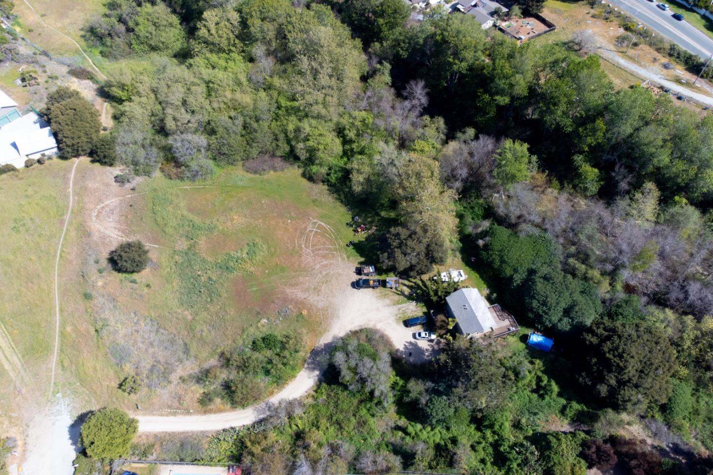 an aerial view of residential house with outdoor space