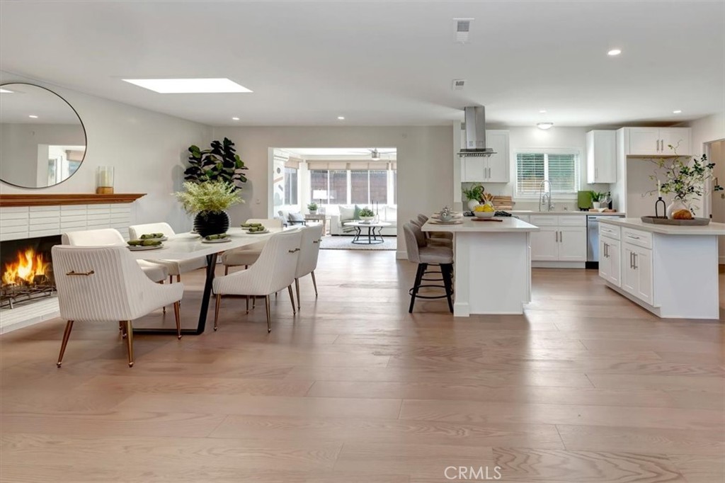 a view of a kitchen and dining room