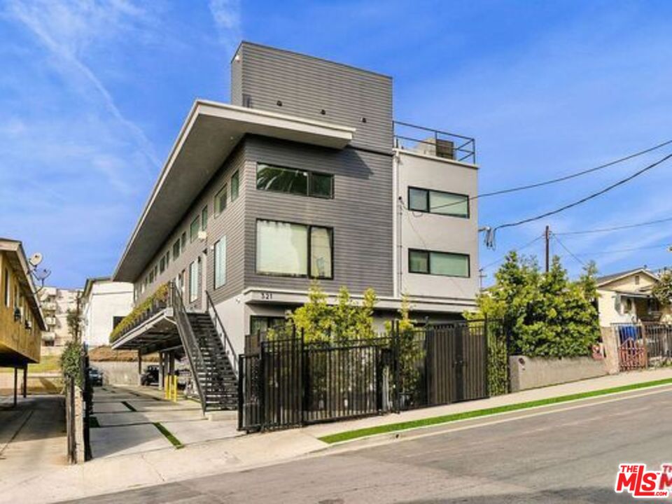 a front view of a house with a garage