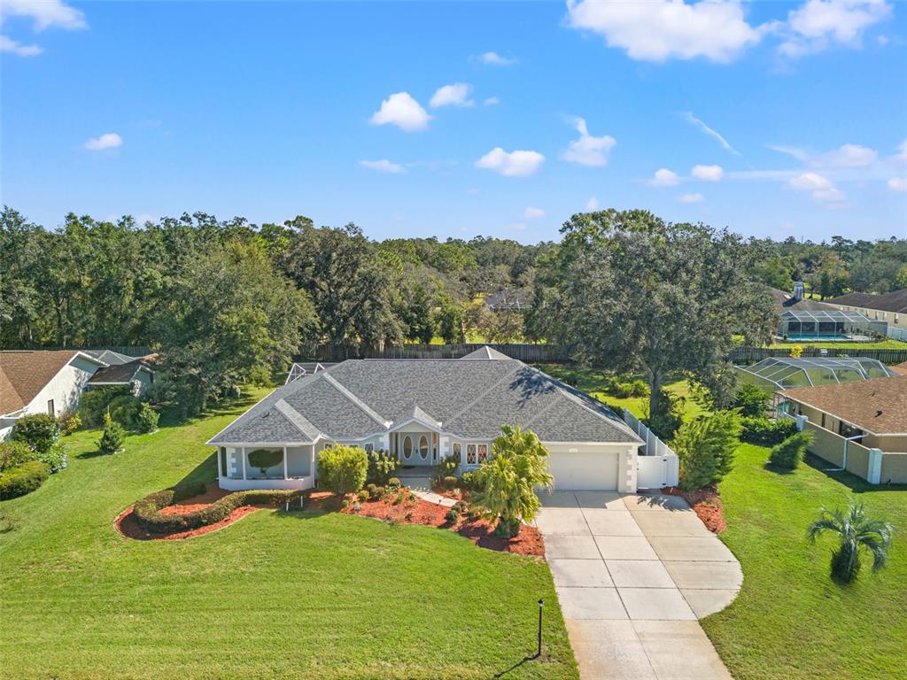 a view of a house with a big yard