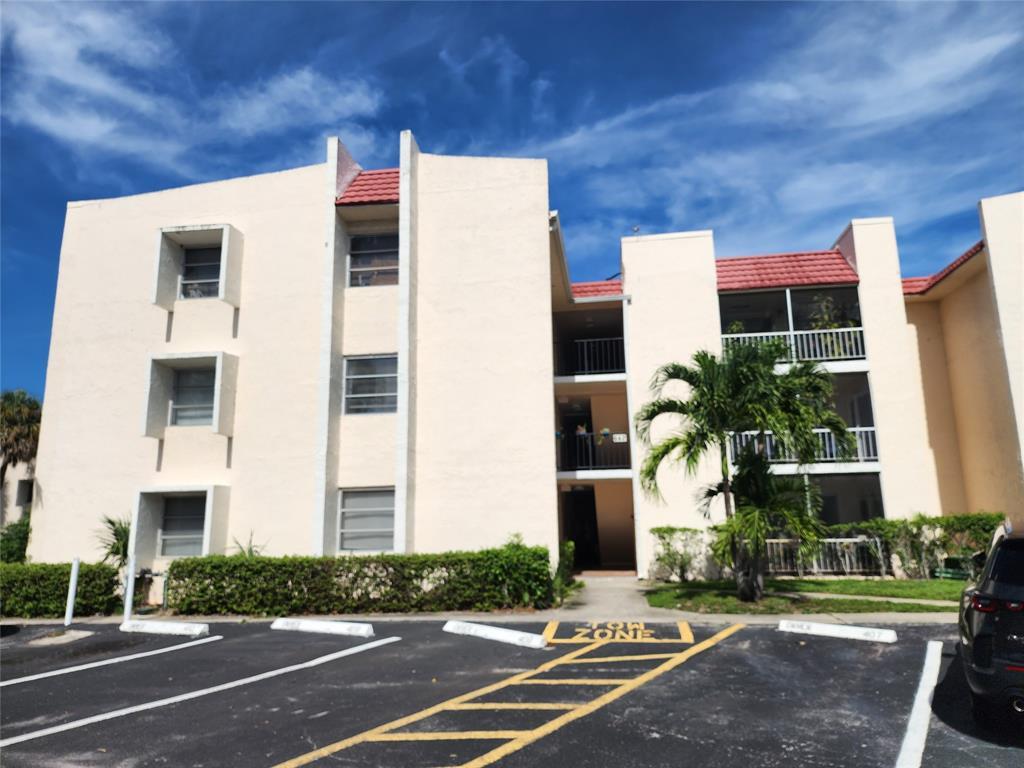 a front view of a building with street