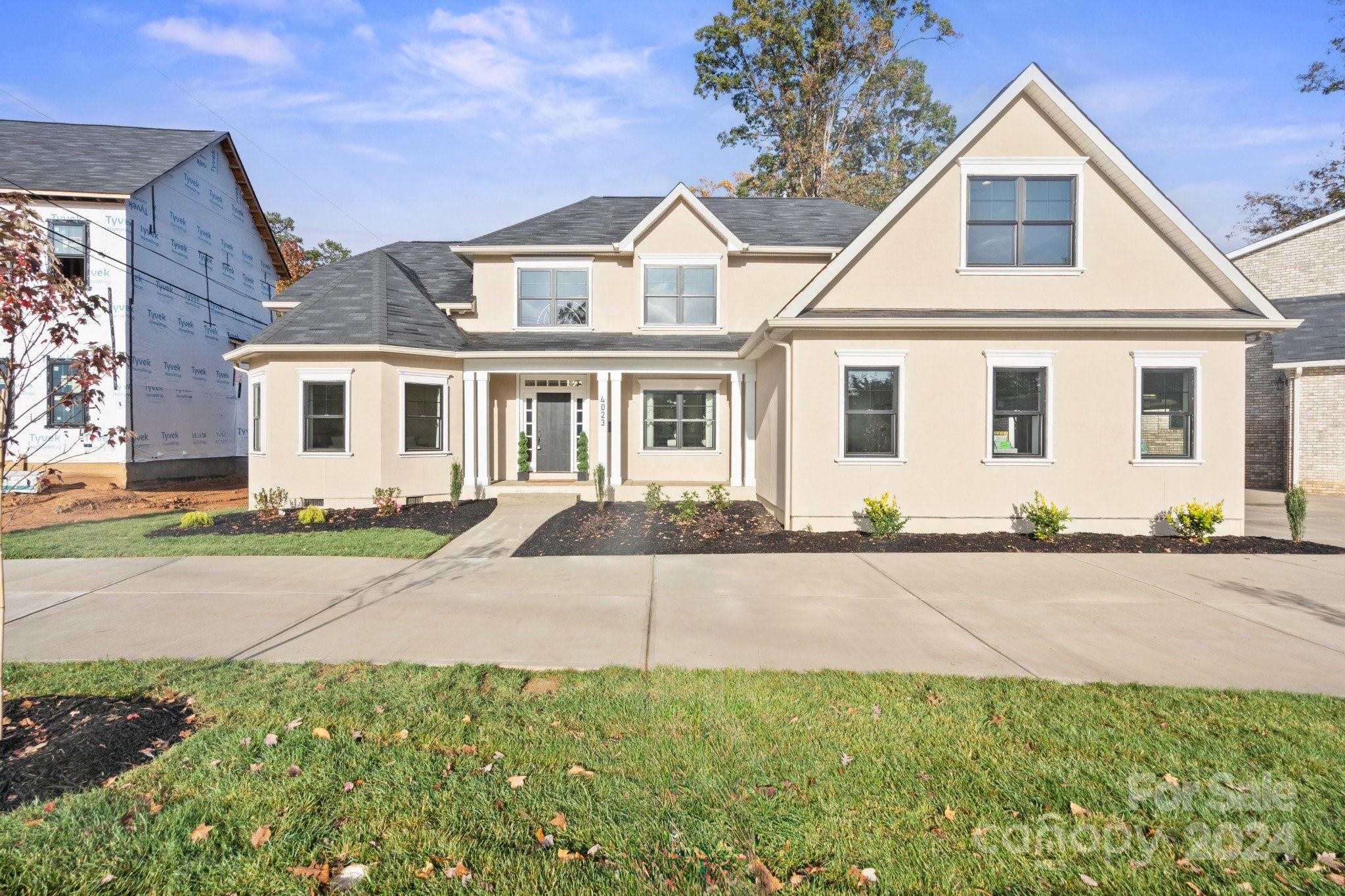 front view of a house and a yard