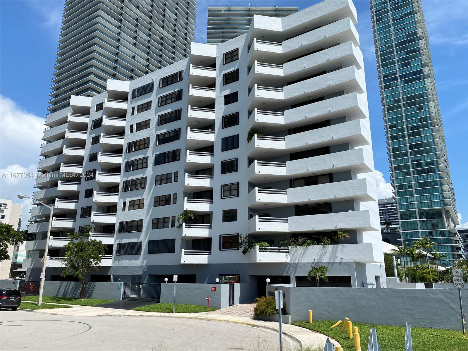 a front view of a building with street view