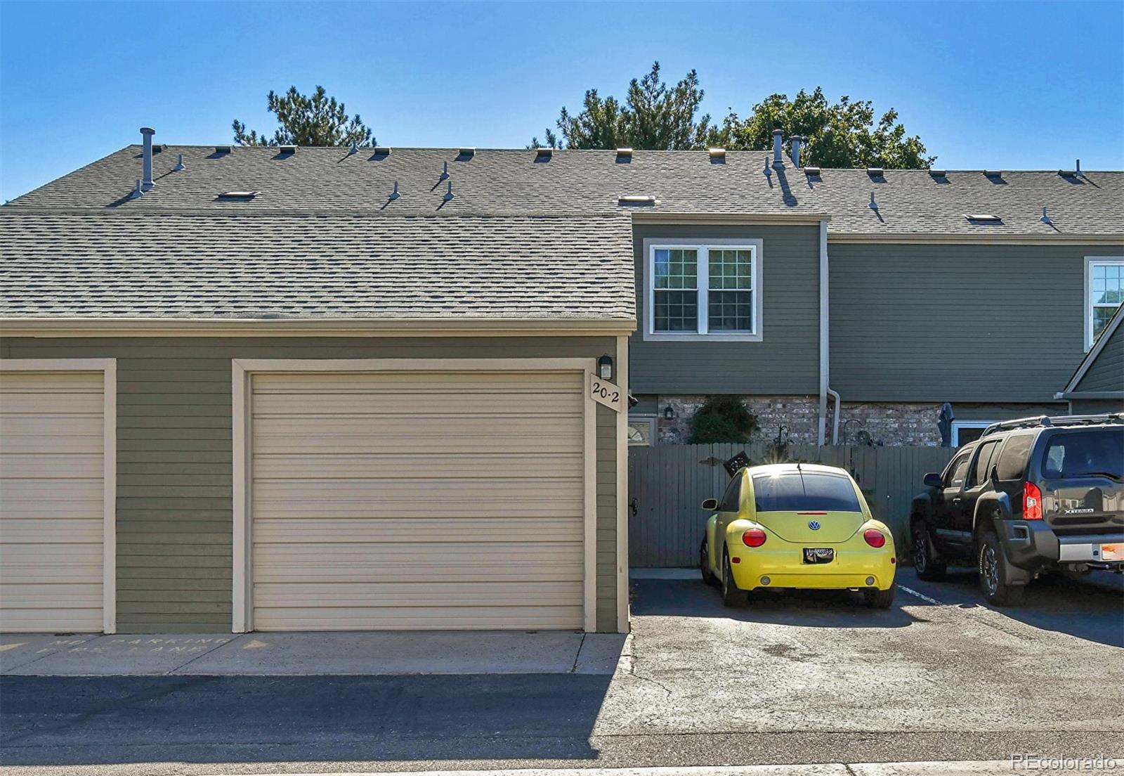 a car parked in front of a house