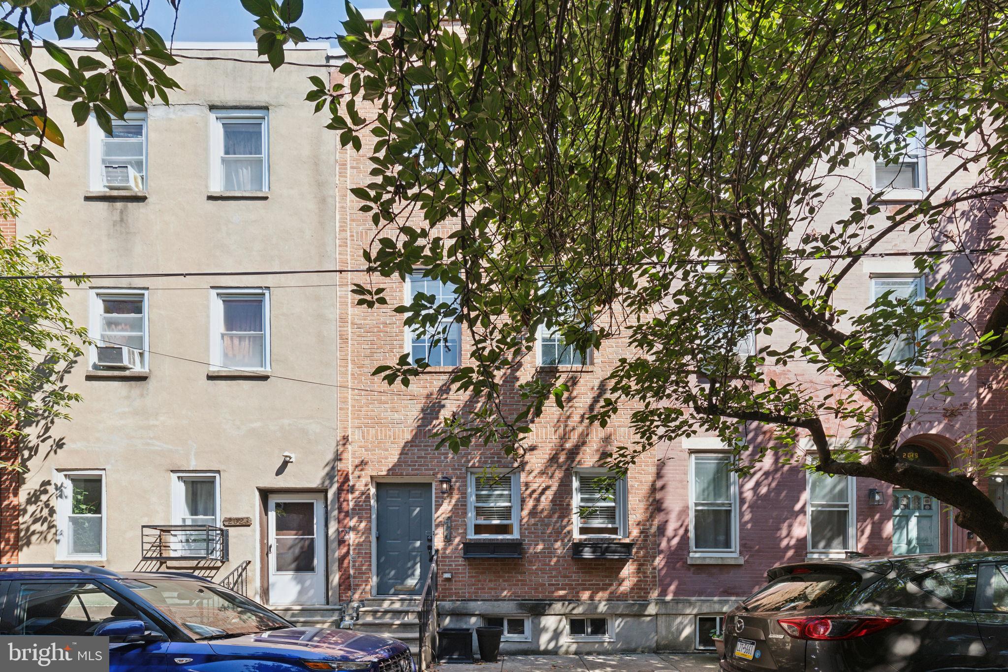 a view of a street with houses