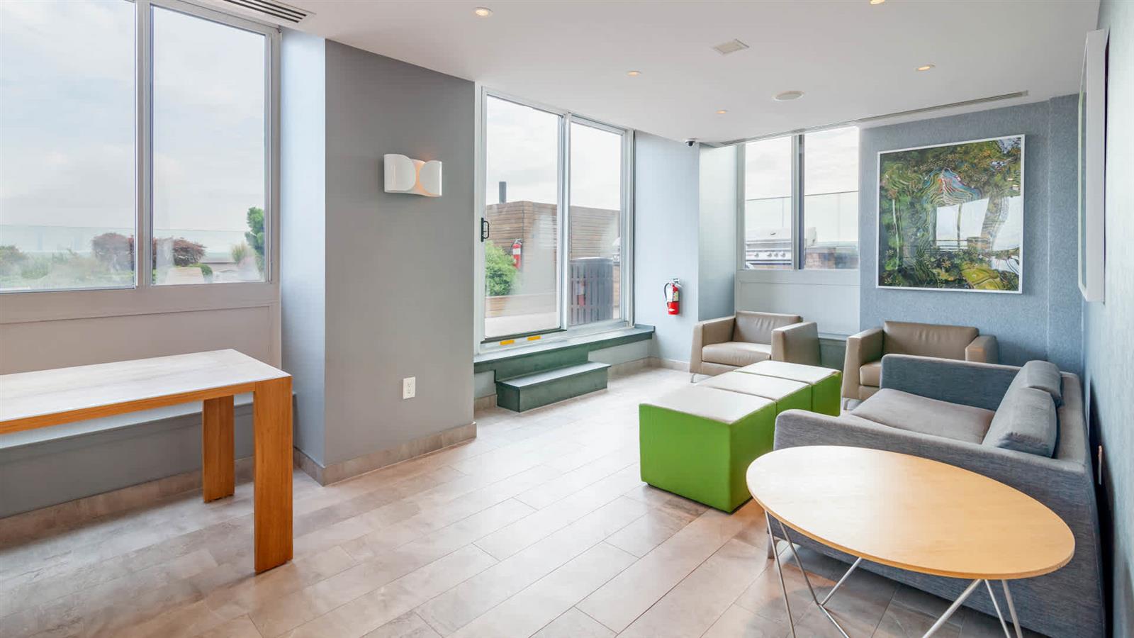 a living room with furniture and a window