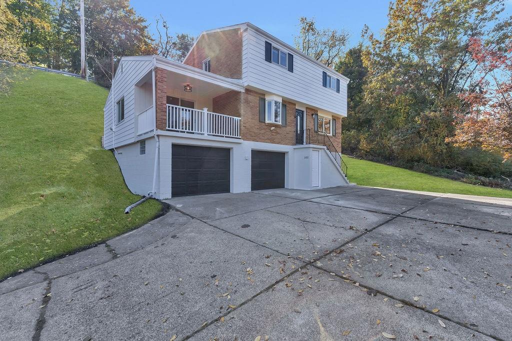 a view of outdoor space yard and front view of a house