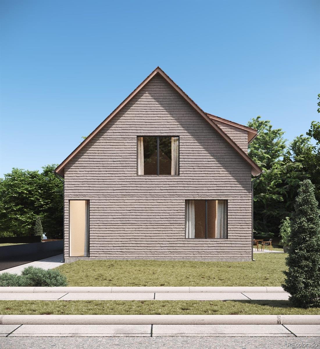 a front view of a house with garage and trees