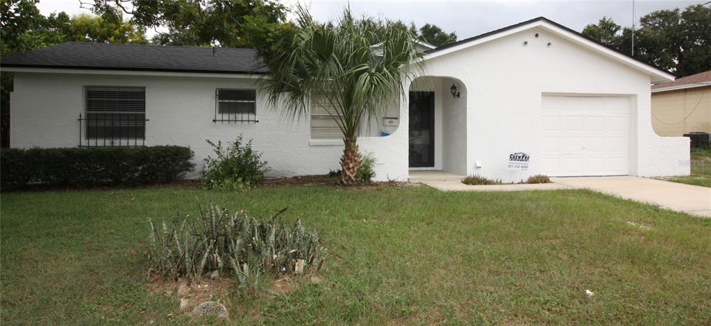 a front view of house with yard