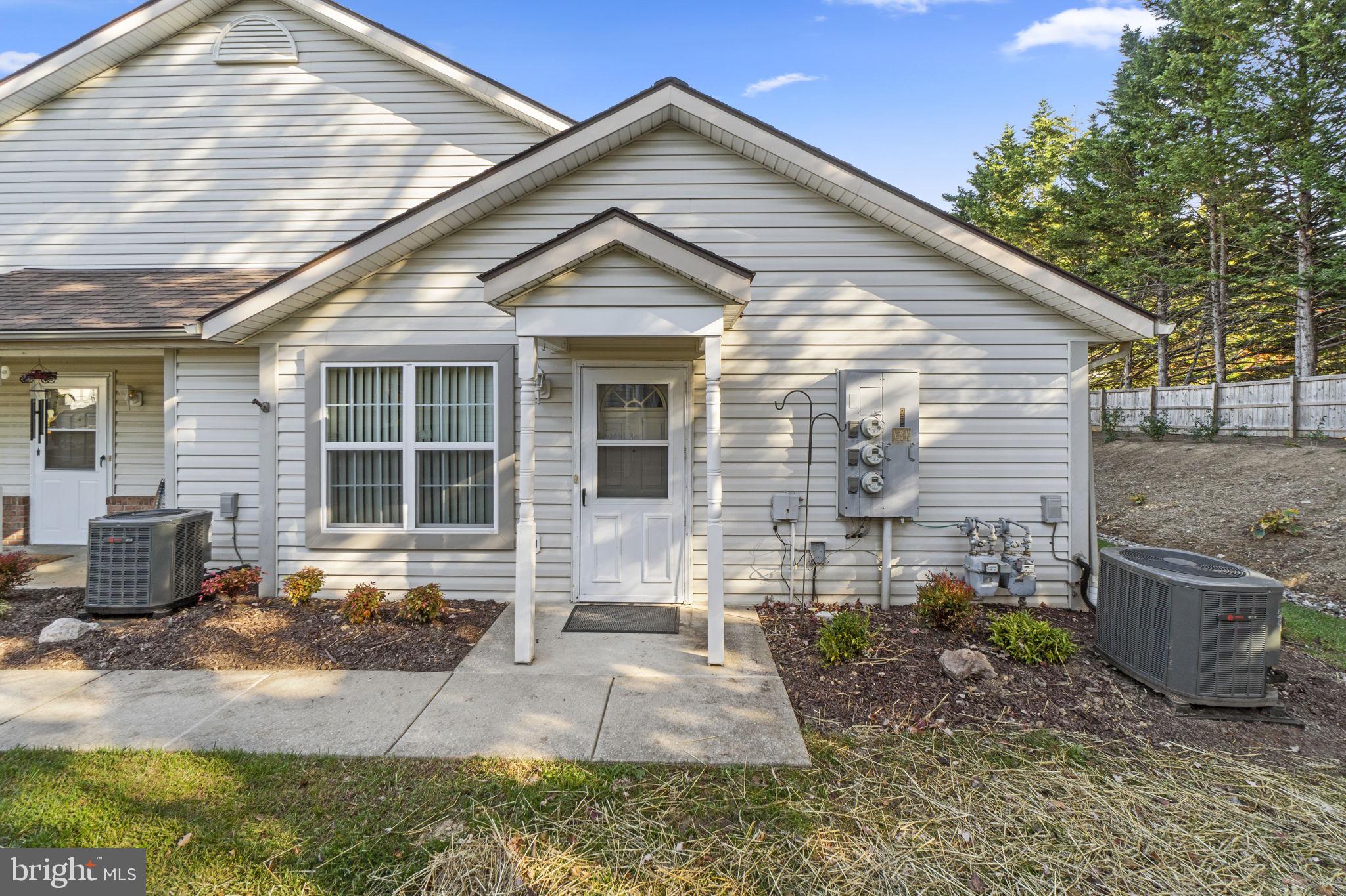 a front view of a house with patio