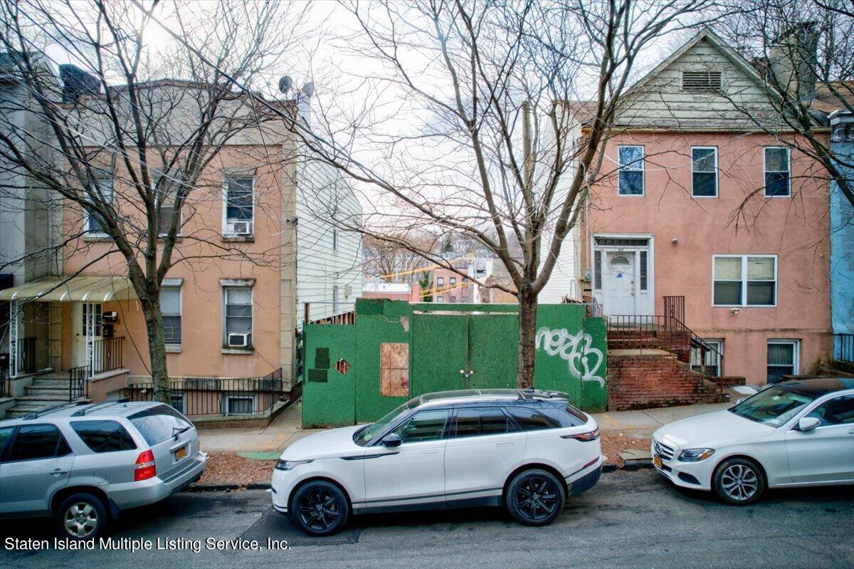 a car parked in front of a house