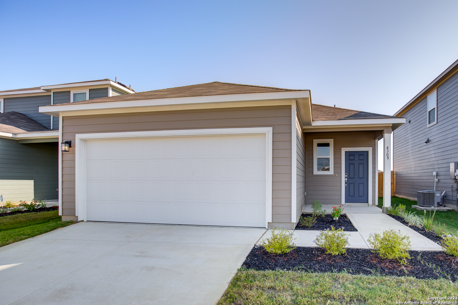 a front view of house with yard