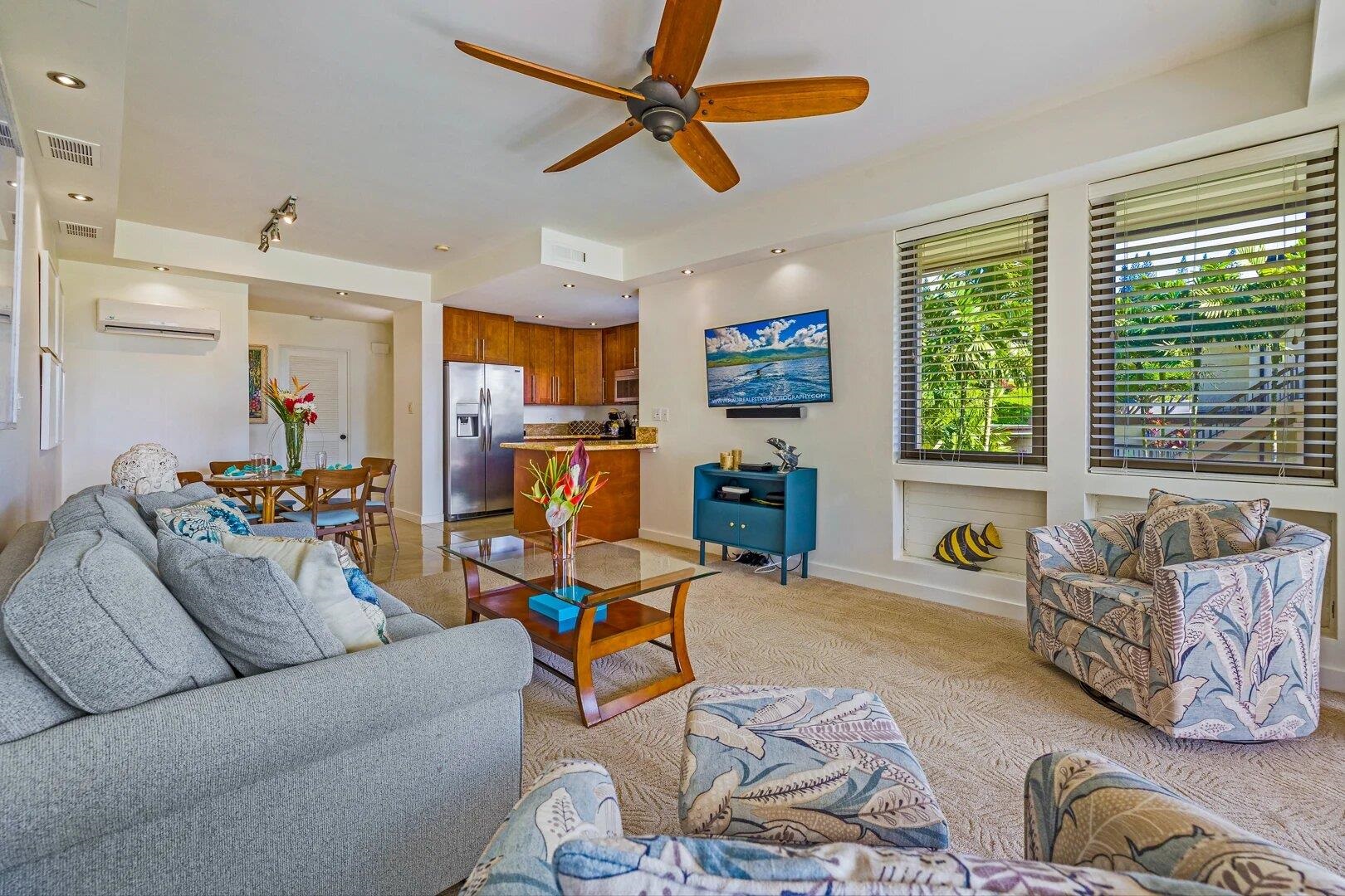 a living room with furniture and a window