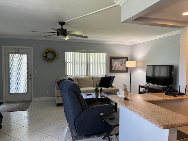 a work room with furniture and a window