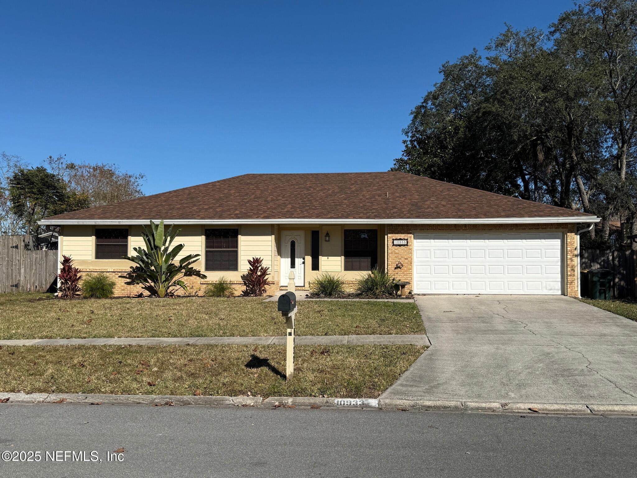 front view of a house with yard