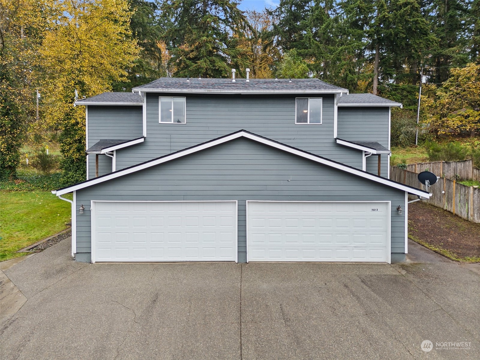 a view of a house with a garage