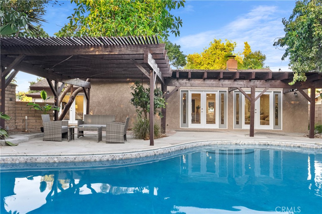 a view of a house with a swimming pool