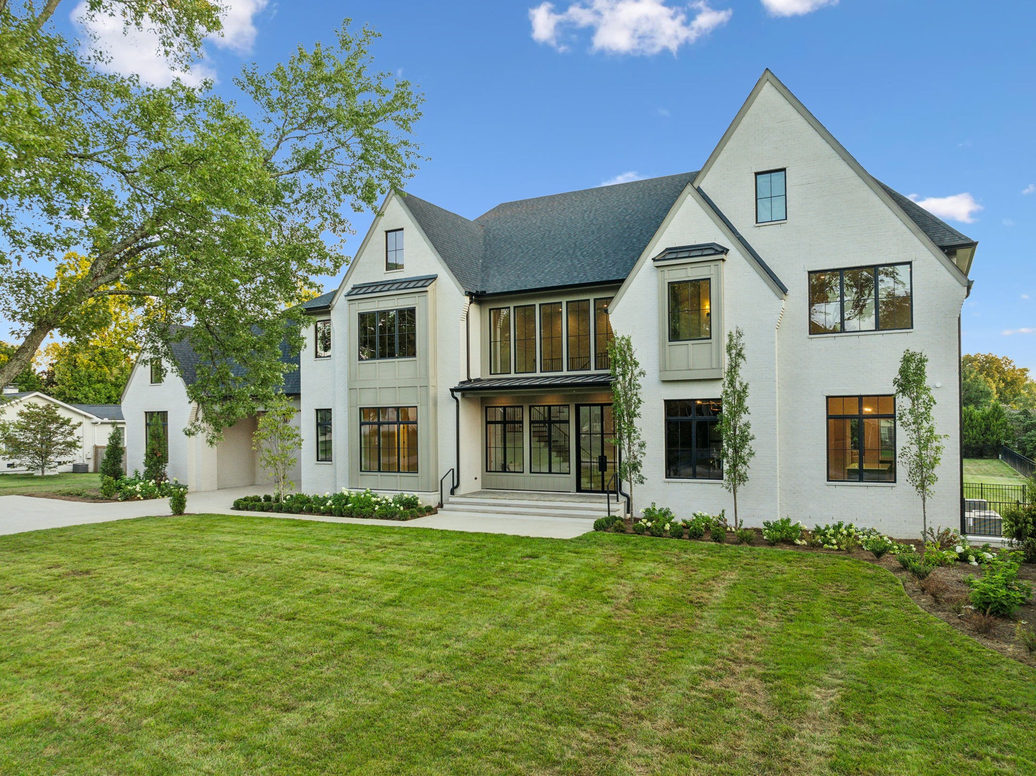 Welcome to this stunning new construction home at 5117 Meadowlake Road in Brentwood.