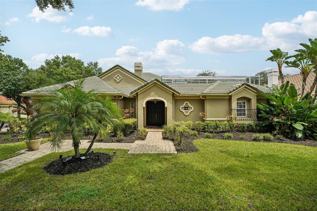 Welcome to the Vista Royale community and this stunning COURTYARD POOL HOME with a SEPARATE IN-LAW SUITE, formal, family and flex spaces, endless natural light and a TILE ROOF all on a .23 ACRE CORNER LOT! 