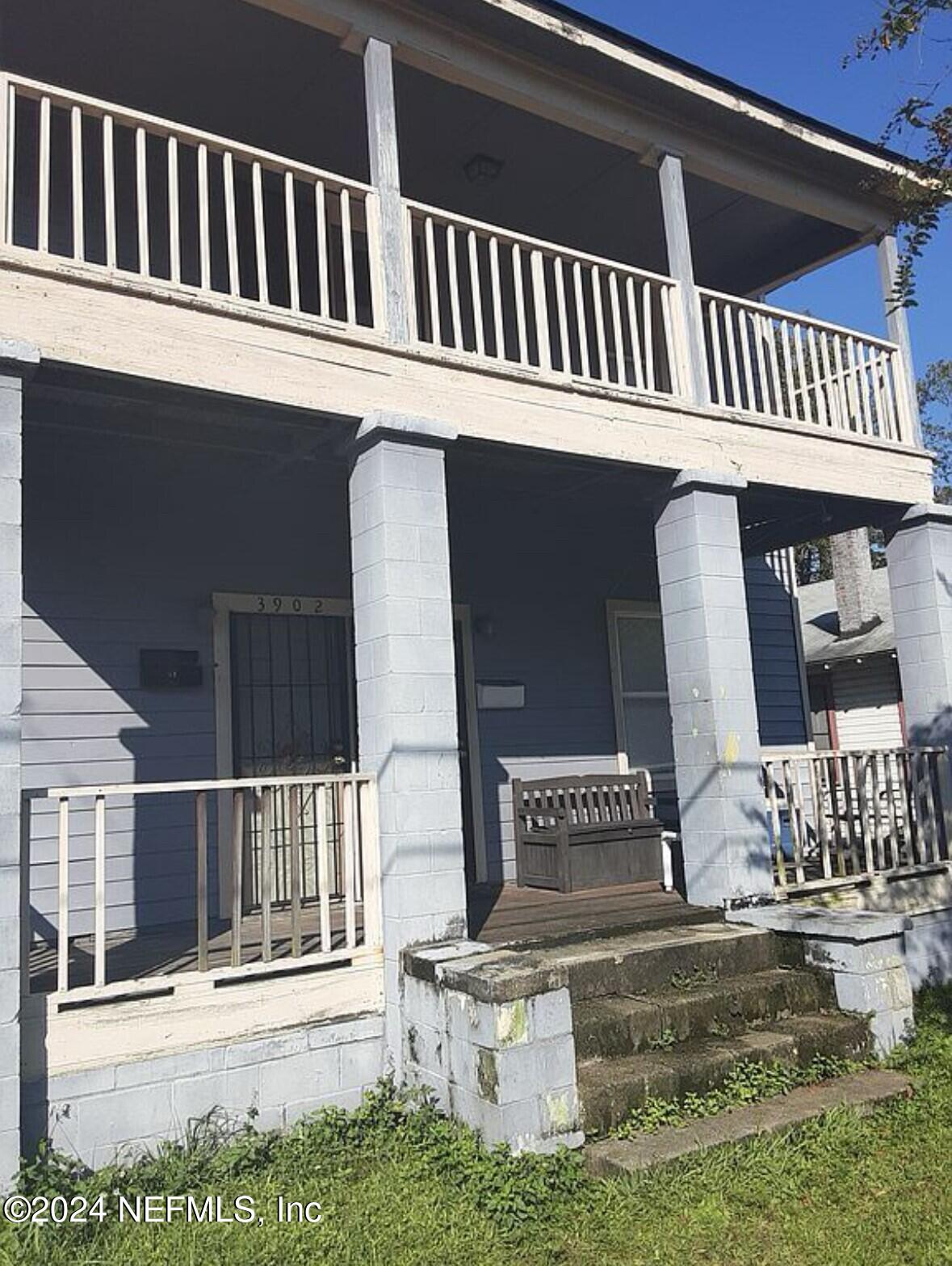 a view of a house with a deck