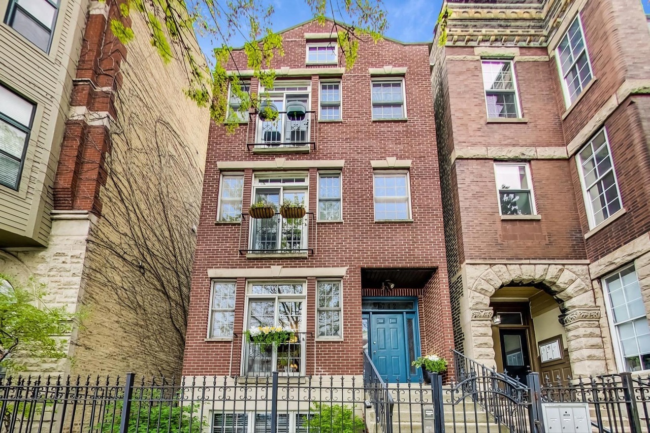 a front view of a multi story residential apartment building