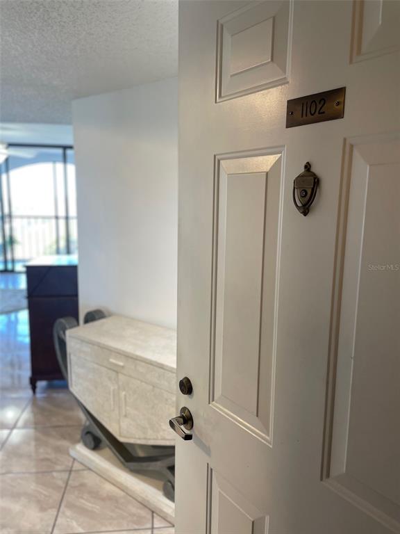 a bathroom with a tub and window