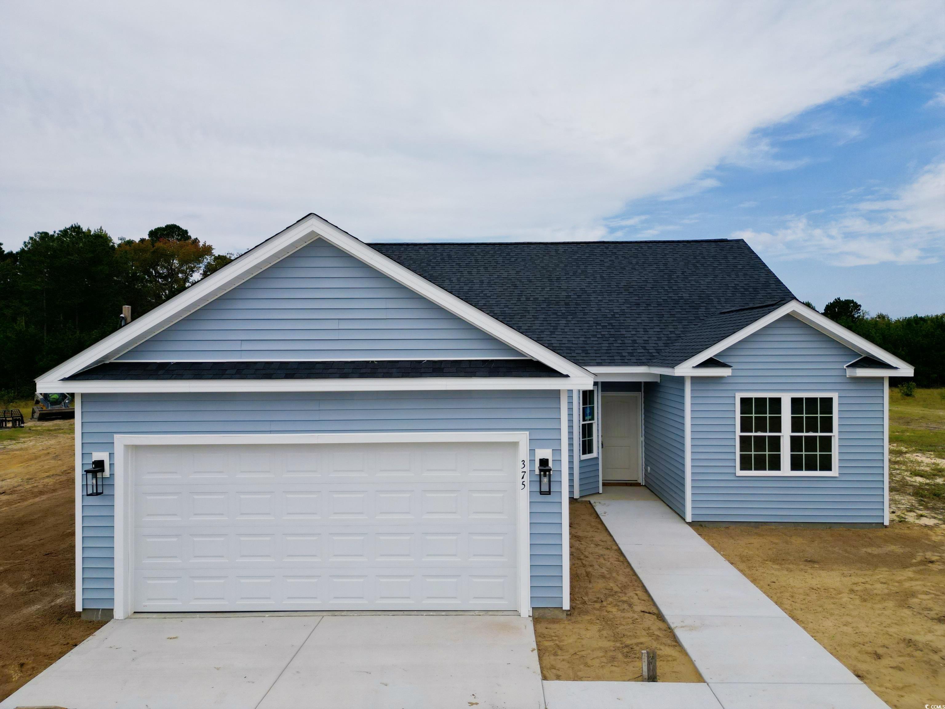 Ranch-style house featuring a garage