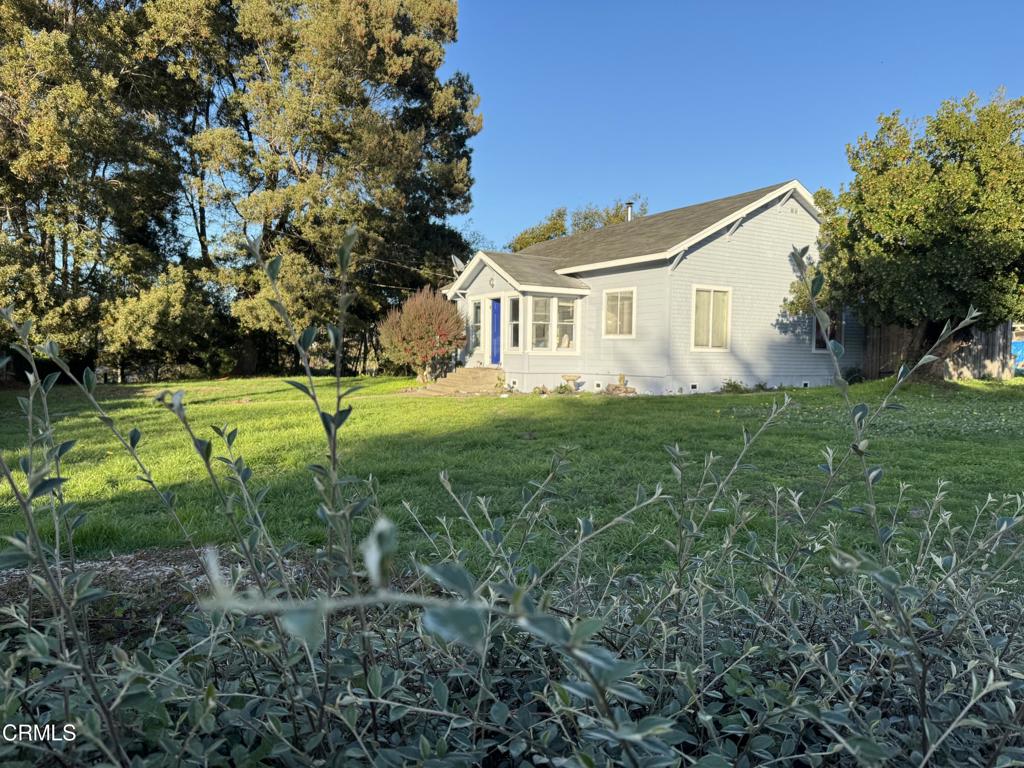 a house view with a garden space