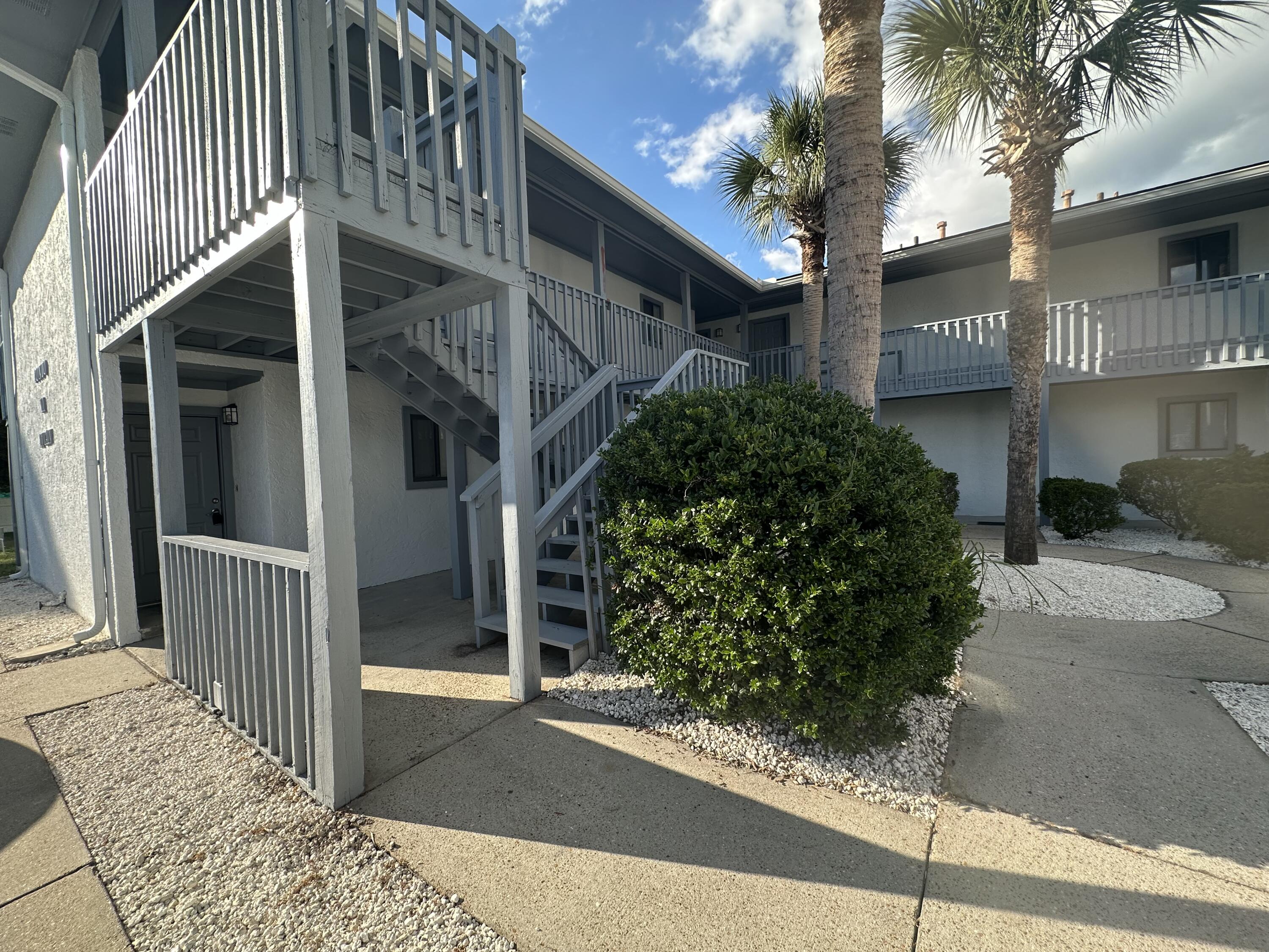 a view of a house with a street