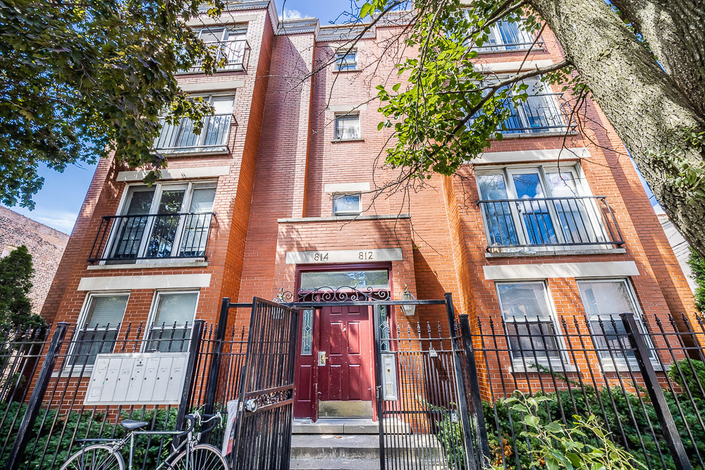 front view of a multi story residential apartment building