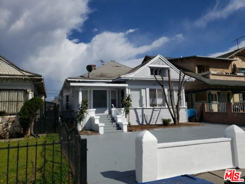 a front view of a house with a porch