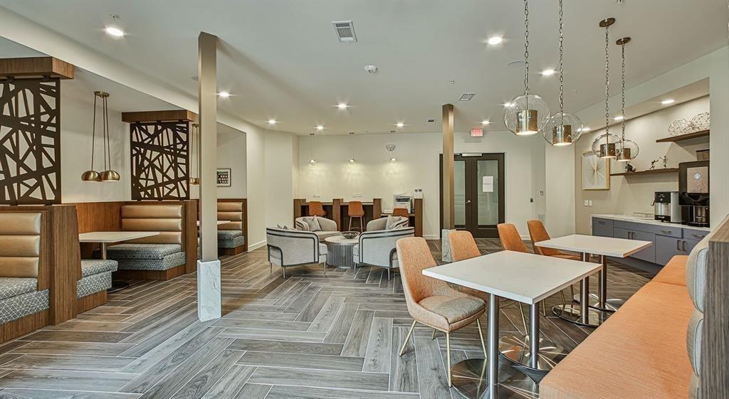 a dinning room and kitchen with a table or chairs