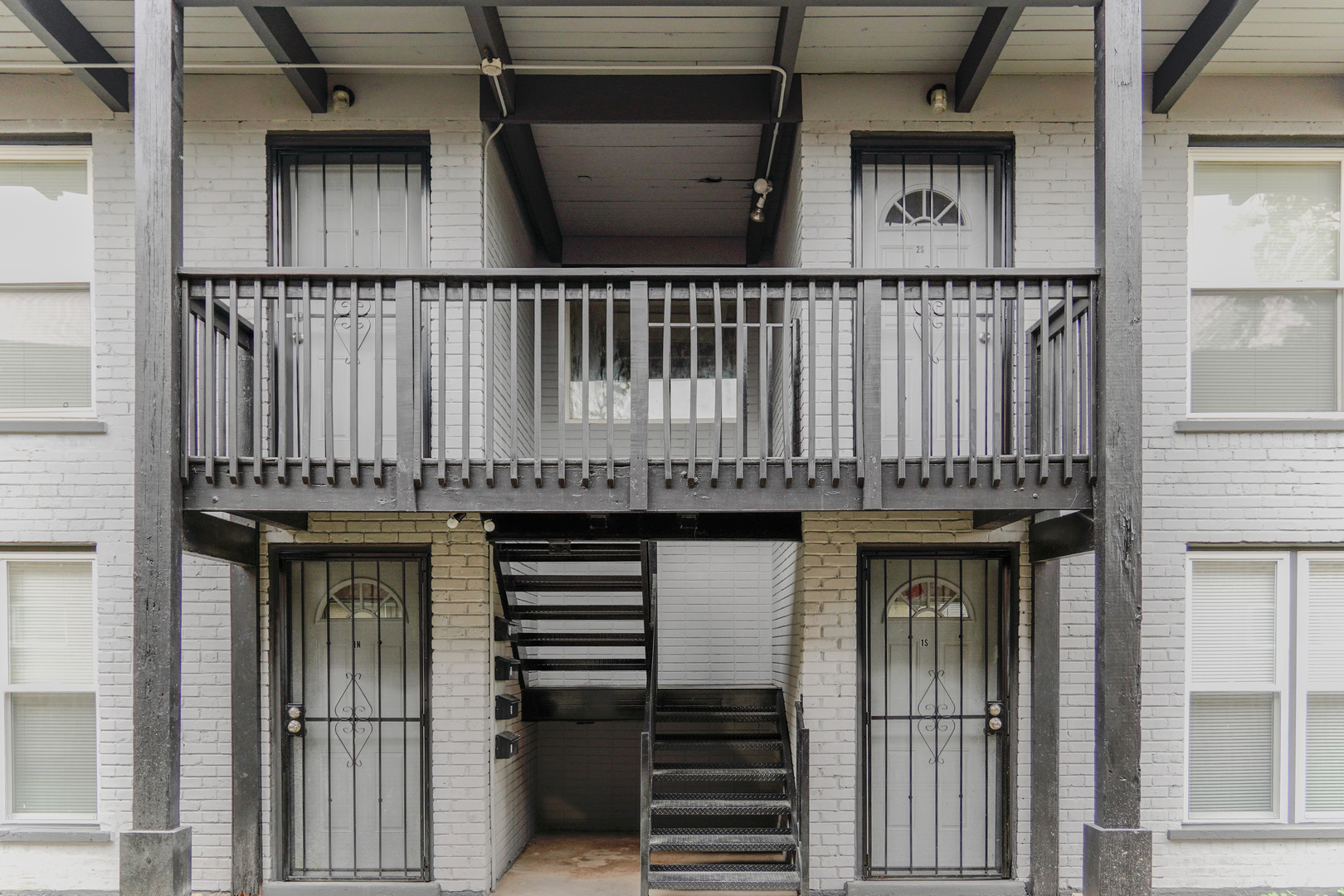 a view of a balcony with a sink