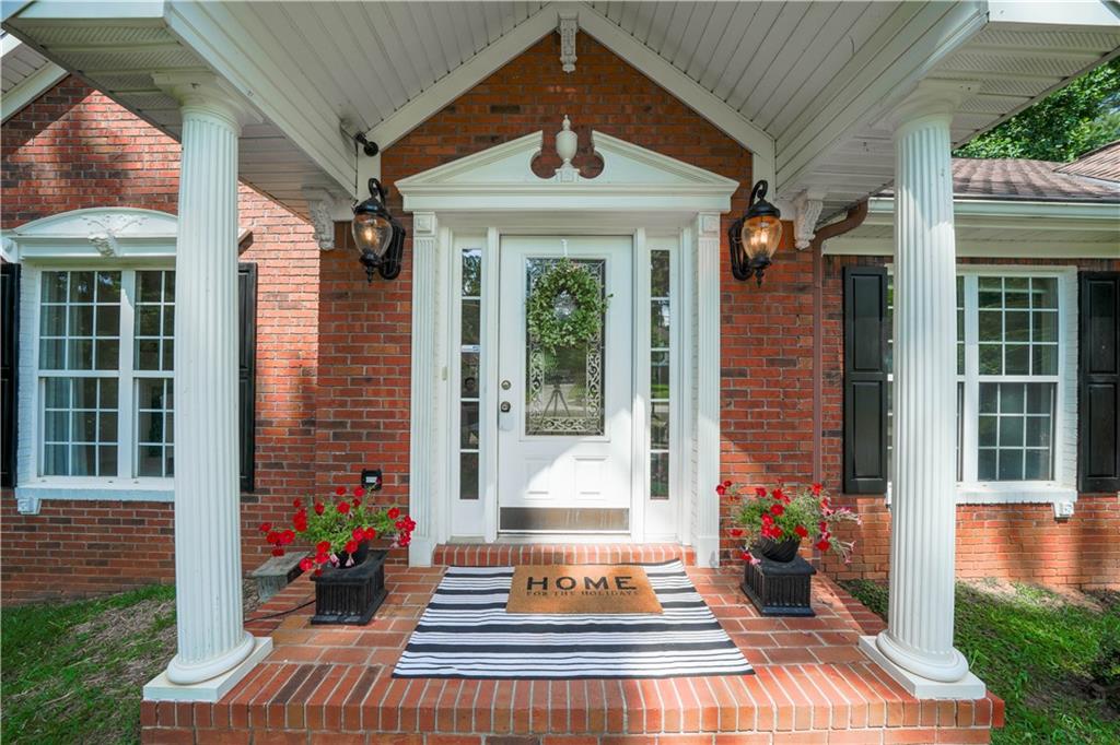 a front view of a house with a porch