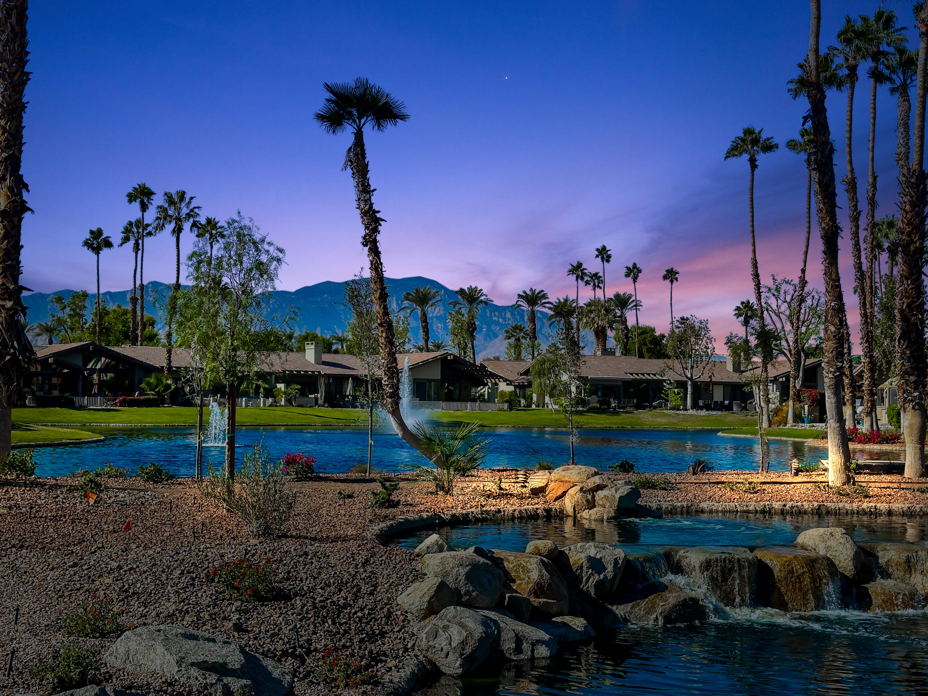 a view of swimming pool outdoor seating and yard