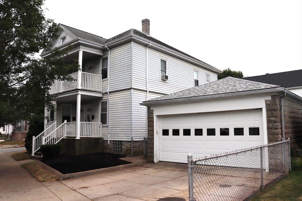 a front view of a house with a balcony