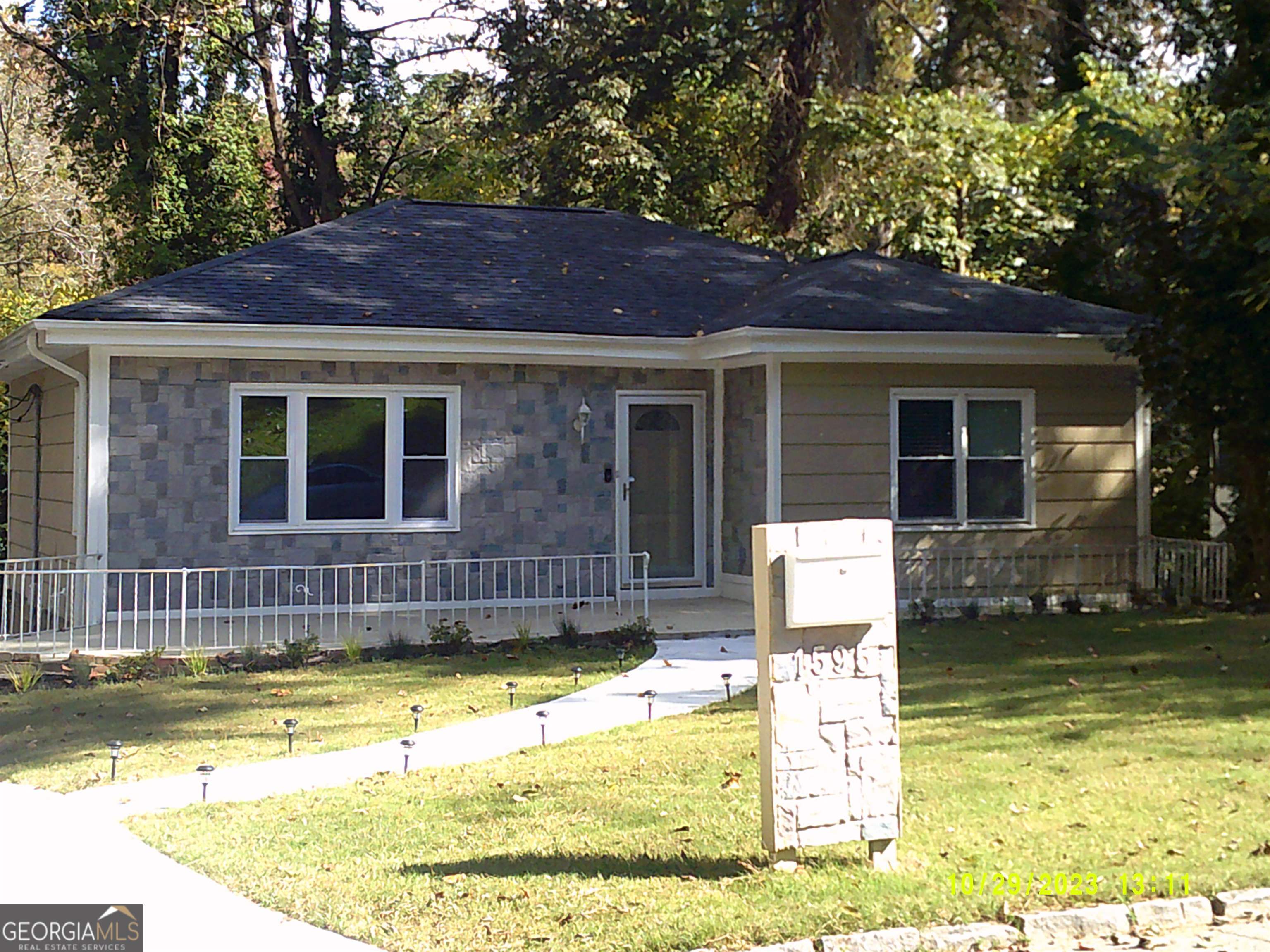 a view of a house with a swimming pool